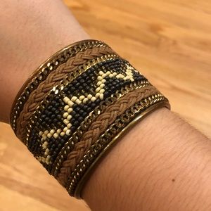 Brown, gold, and black beaded cuff bracelet